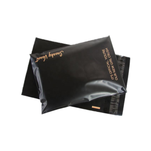 Two black plastic mailing bags with gold printed text